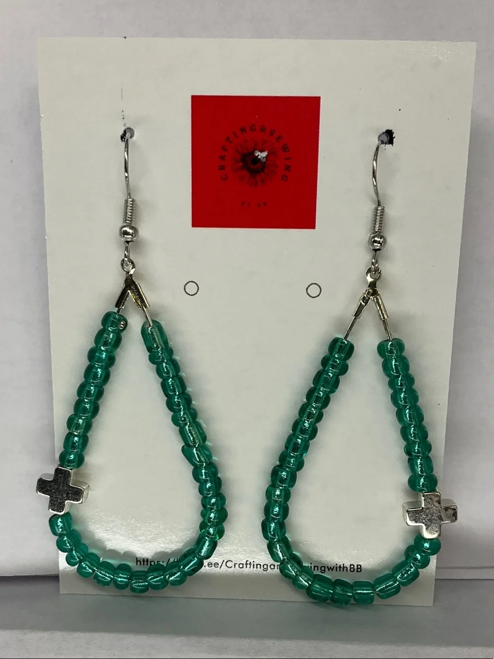 Green Beaded Teardrop Earrings with Silver Cross Accent by